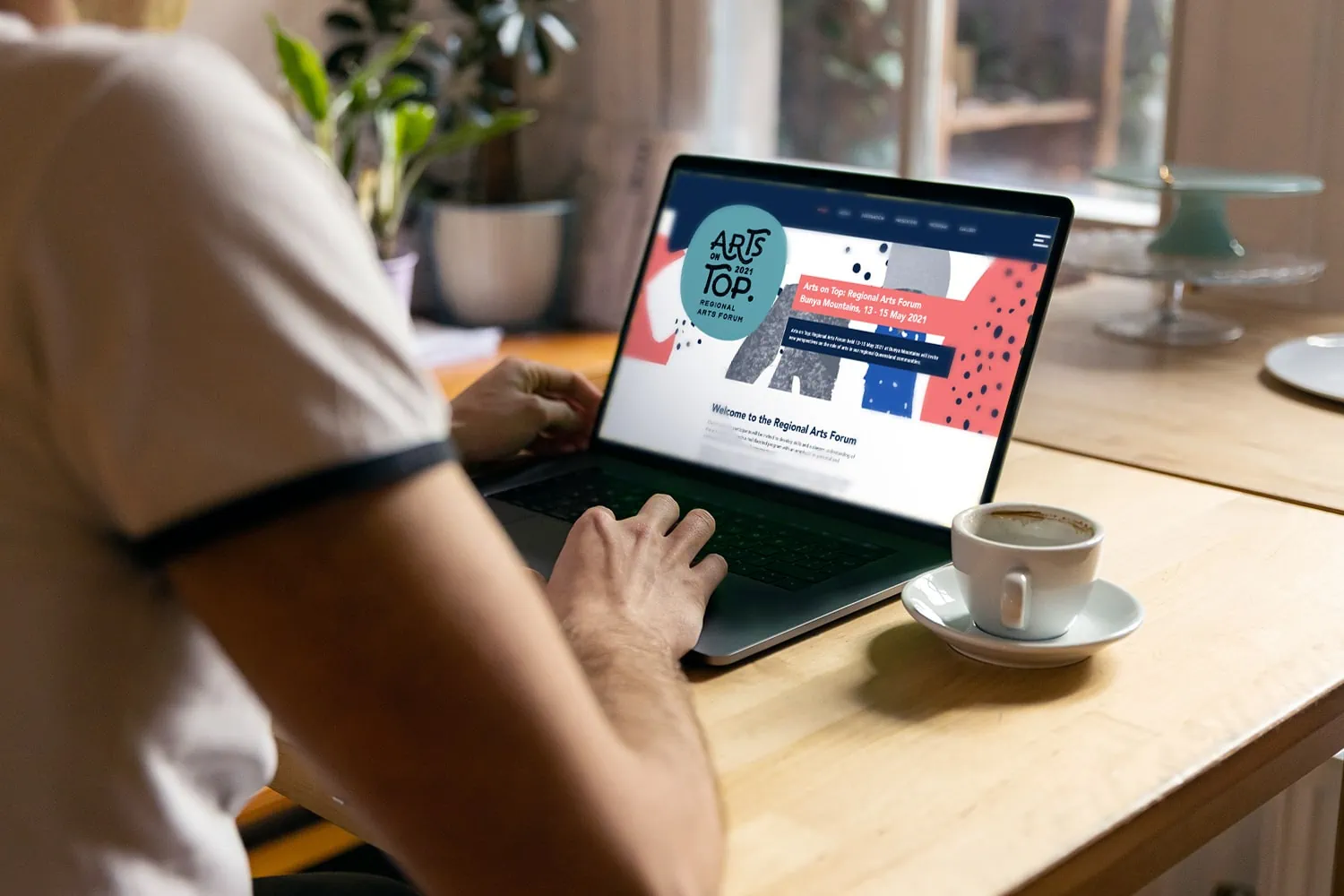 artist doing graphic designs on his laptop