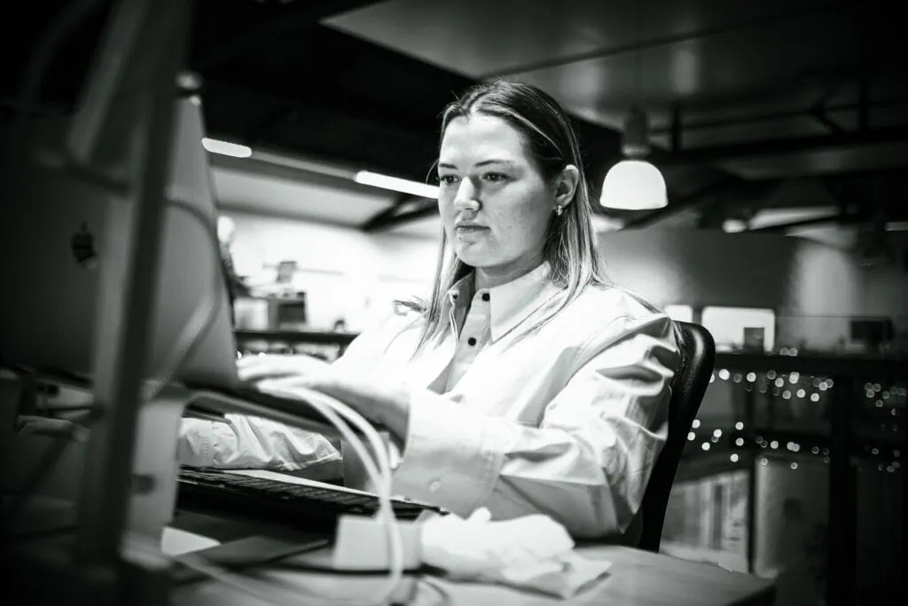 working woman infront of her laptop