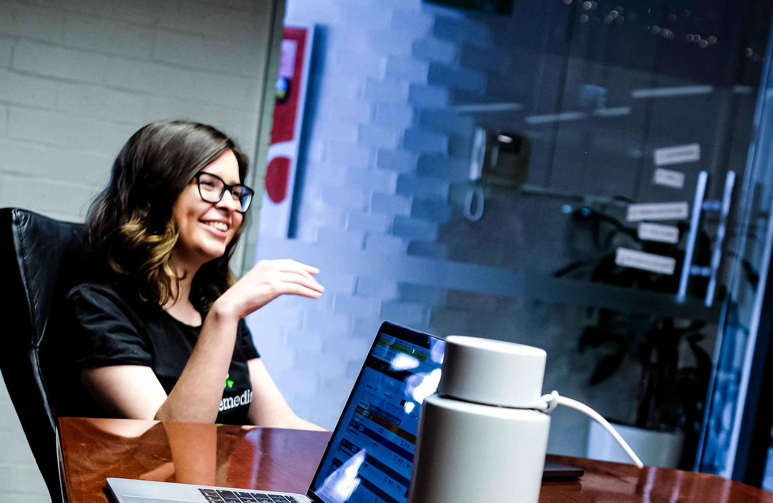 woman smilling white in a meeting