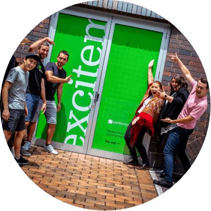 Excite media brisbane office with employees group photo