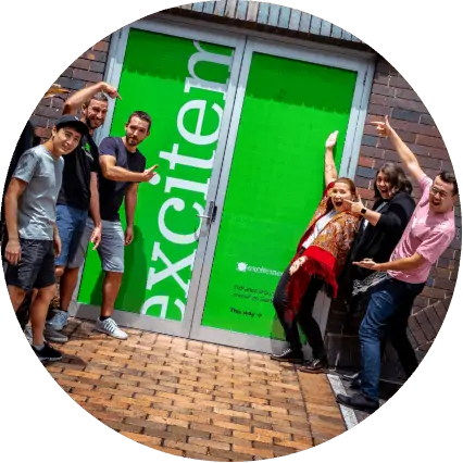 Excite media brisbane office with employees group photo