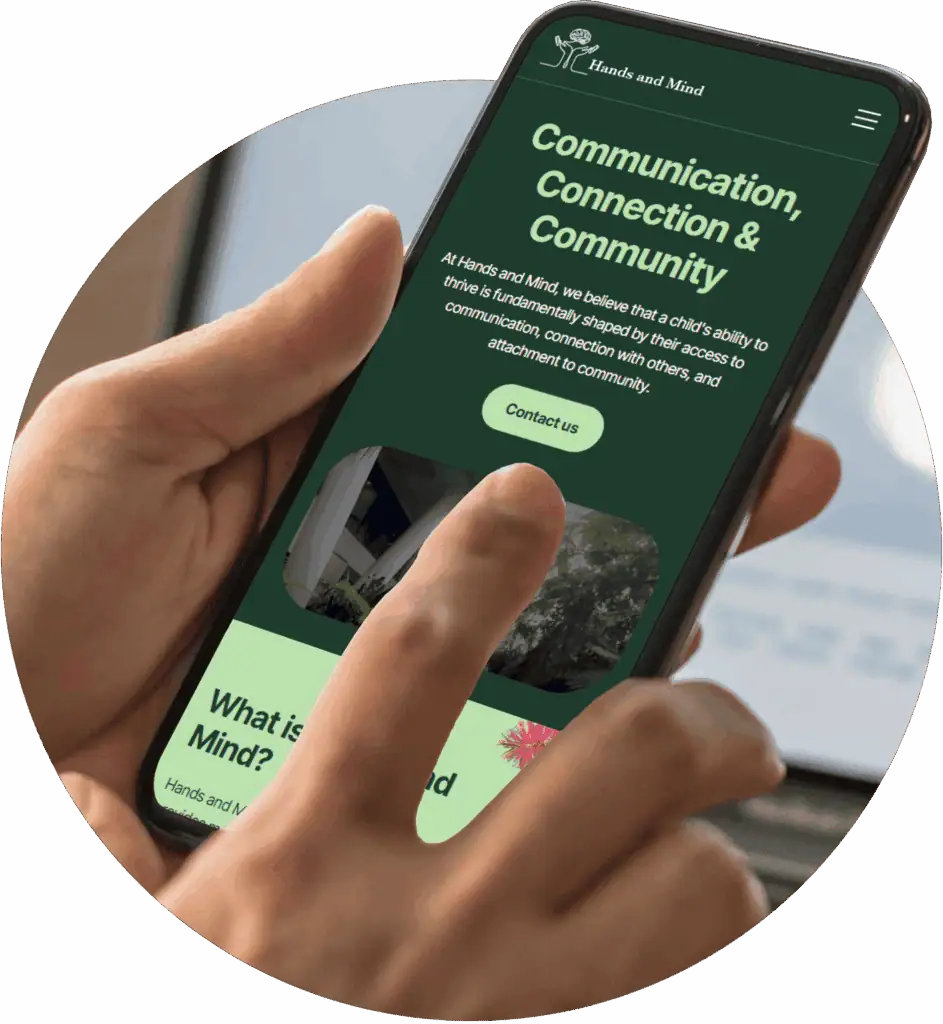 smartphone displaying Hands and Mind website