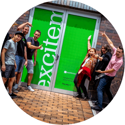 Excite media brisbane office with employees group photo